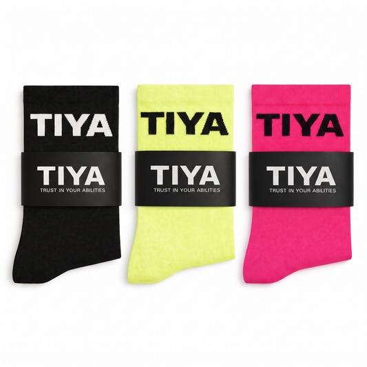 TIYA Running Socks 3-Pack – black, yellow and pink pairs on white background